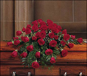 Blooming Red Roses Casket Spray from Arjuna Florist in Brockport, NY